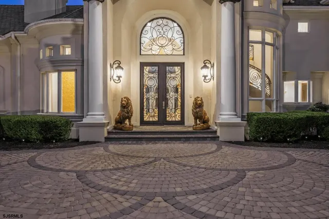 a front view of a house with a porch