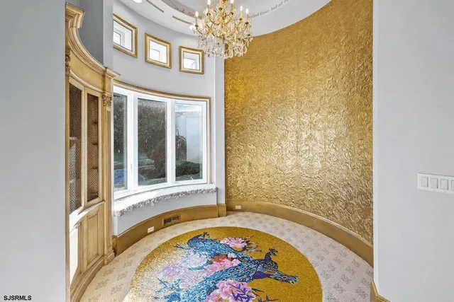 a view of a bathroom with a tub and door