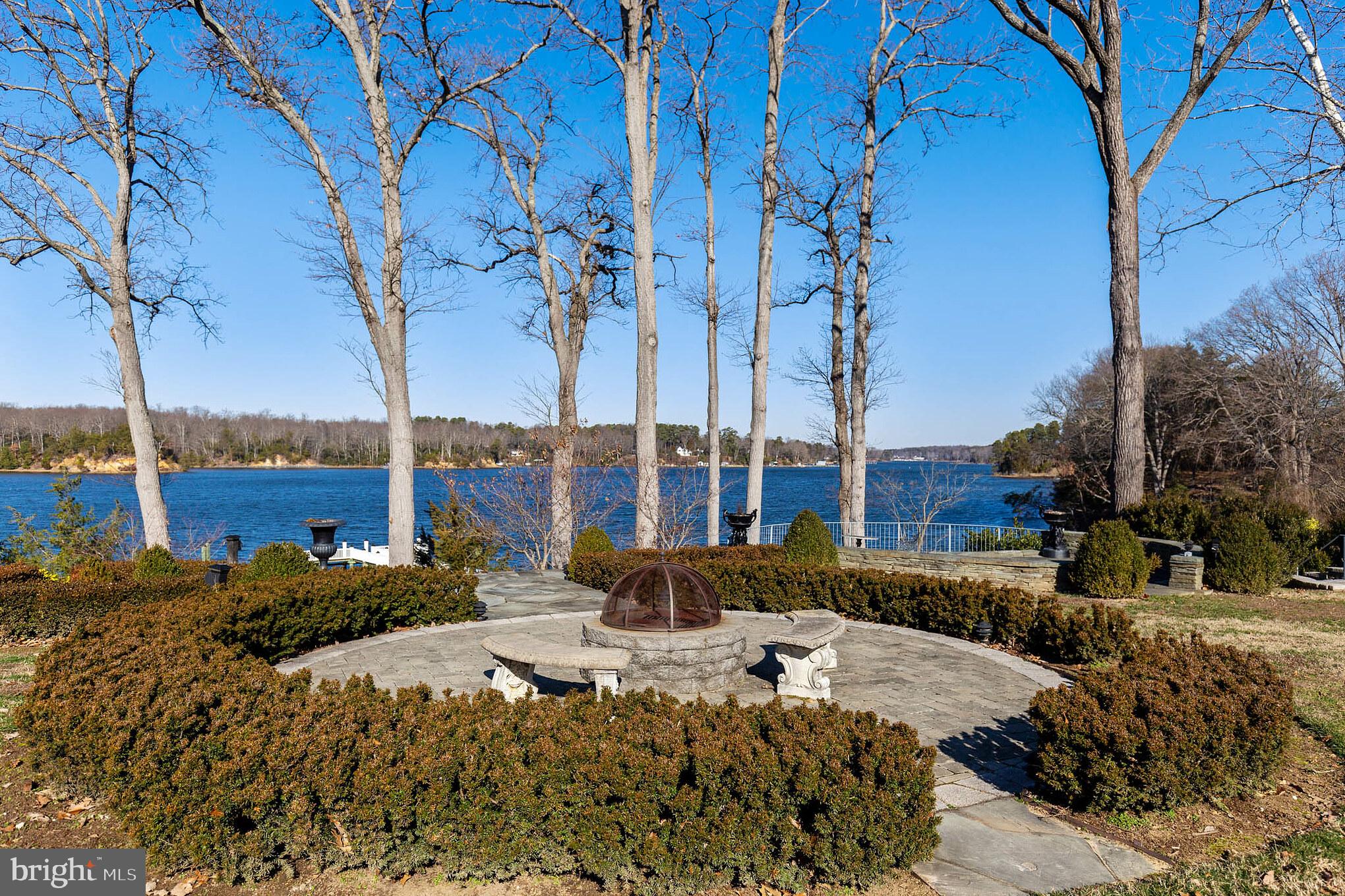 10756 Sawpit Cove Road Lusby, MD 20657 - Photo 12 of 39 Incredible creek views from firepit patio