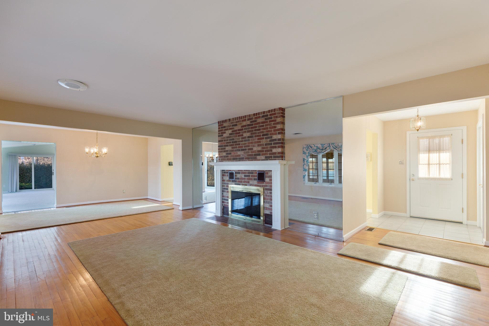 10756 Sawpit Cove Road Lusby, MD 20657 - Photo 22 of 39 Brick wood burning fireplace