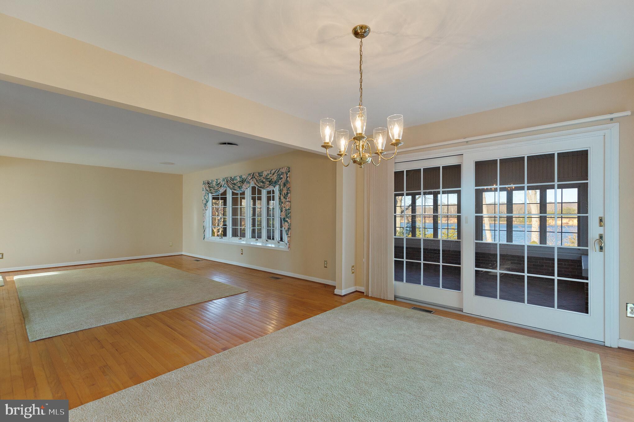 10756 Sawpit Cove Road Lusby, MD 20657 - Photo 23 of 39 Dining room, access to sunroom.