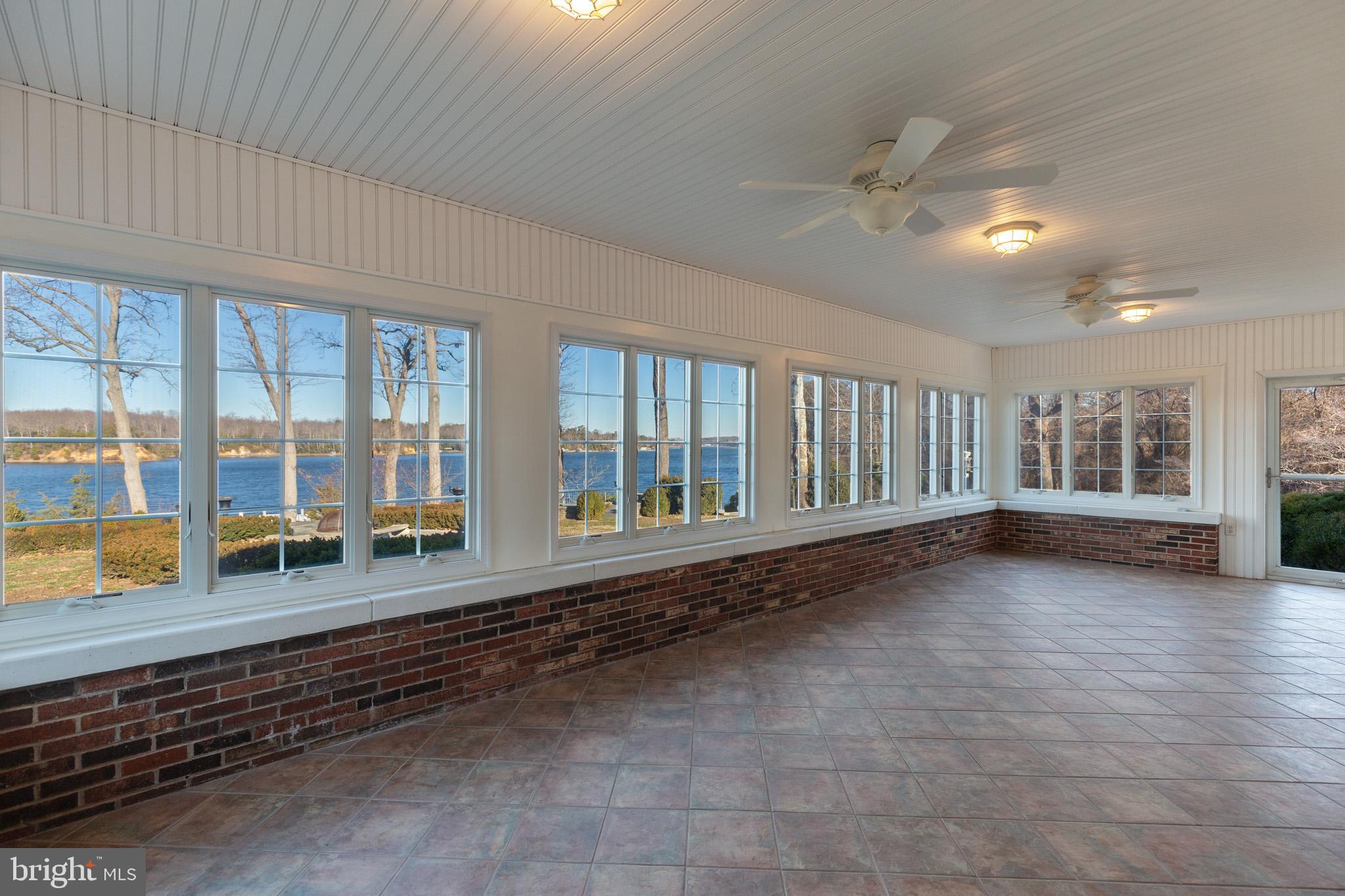 10756 Sawpit Cove Road Lusby, MD 20657 - Photo 24 of 39 Sunroom with St. Leonard Creek vistas.