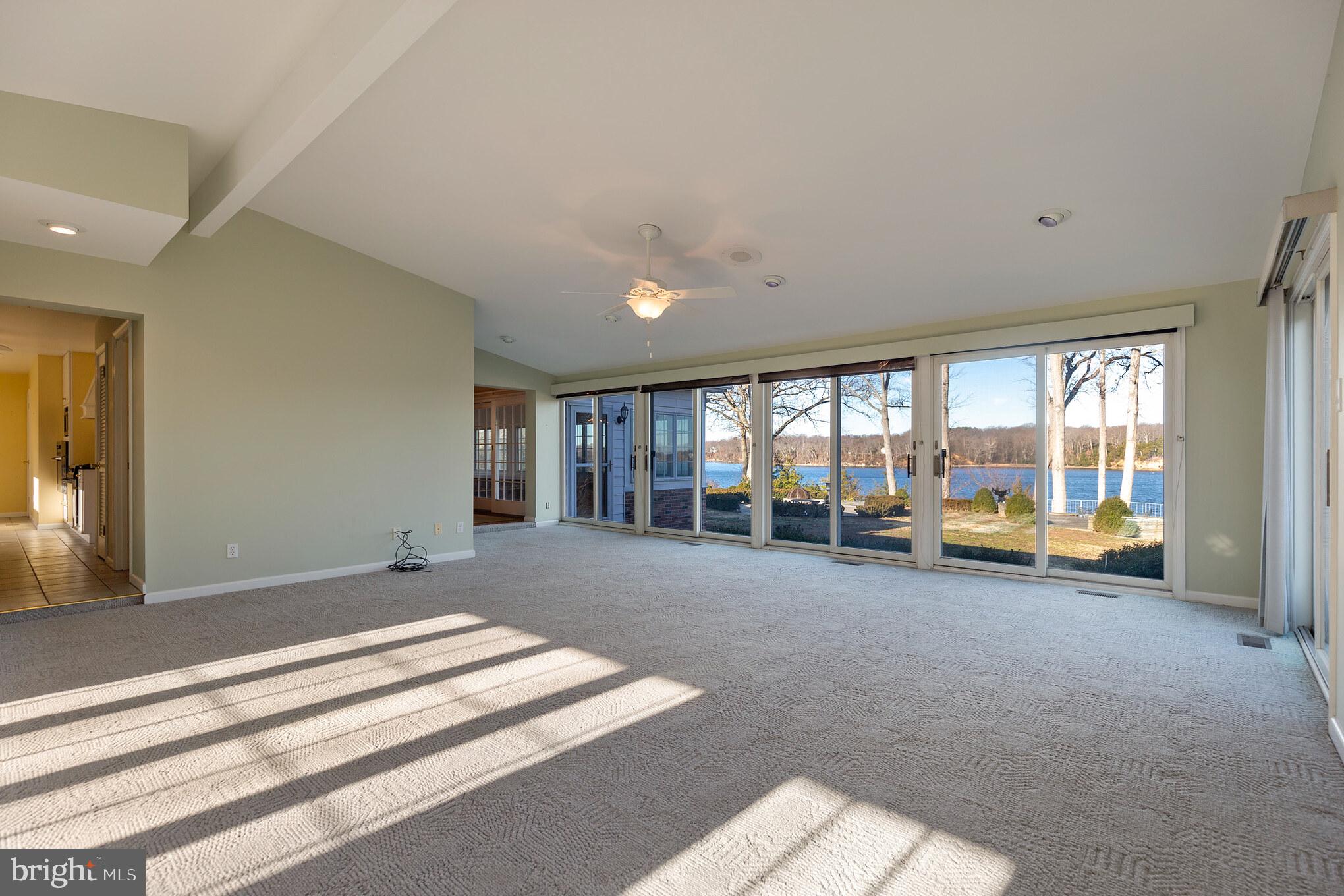 10756 Sawpit Cove Road Lusby, MD 20657 - Photo 25 of 39 Gorgeous family room with big views.
