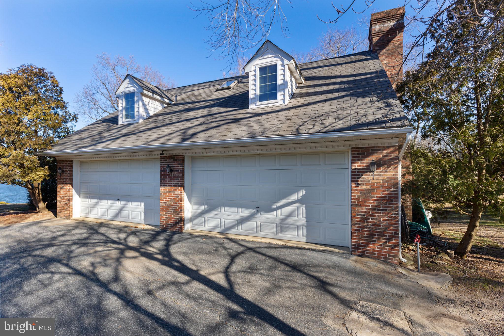 10756 Sawpit Cove Road Lusby, MD 20657 - Photo 5 of 39 4 car garage.