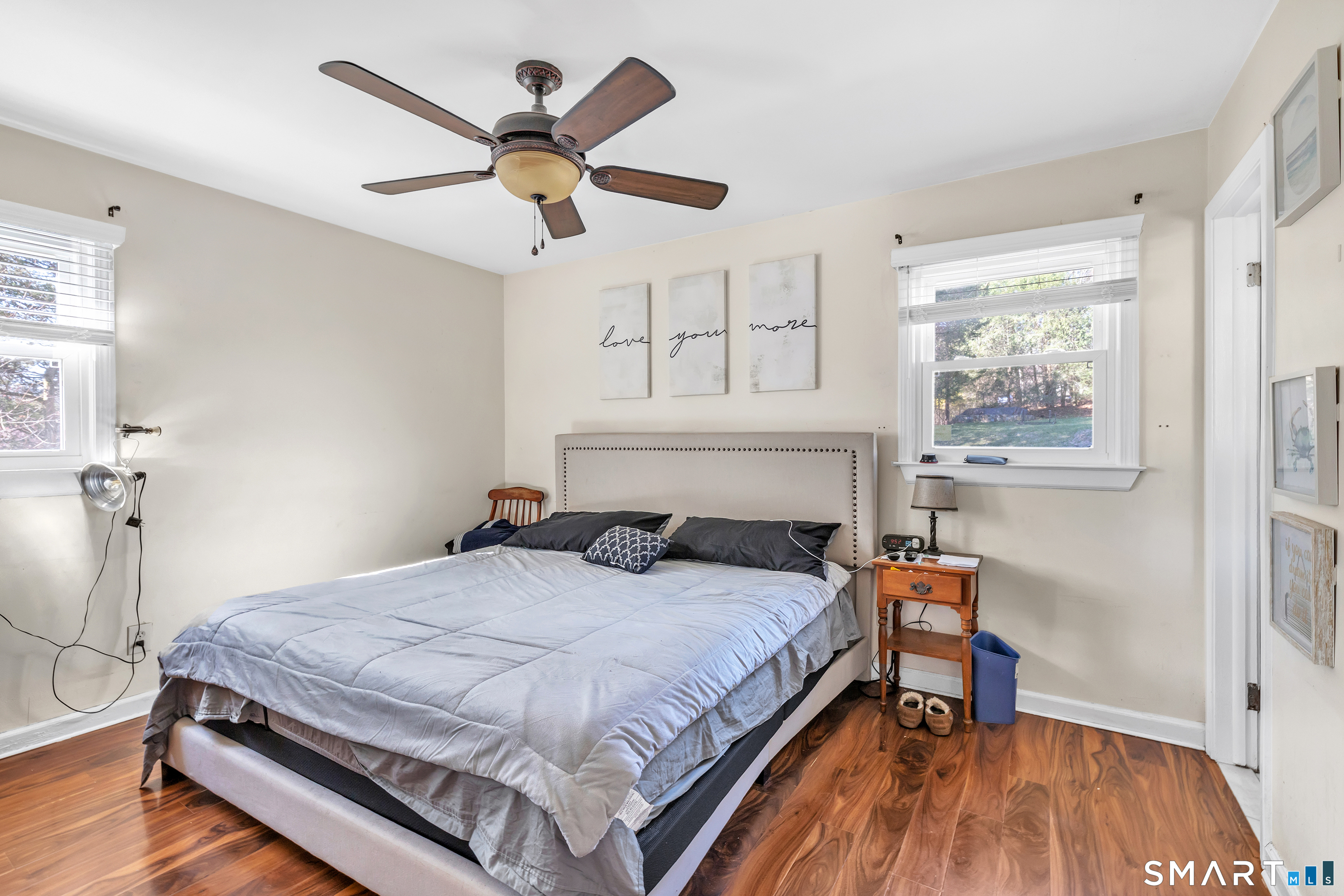 52 Cook Lane Beacon Falls, CT 06403 - Photo 19 of 24 a bedroom with a bed and a table in it