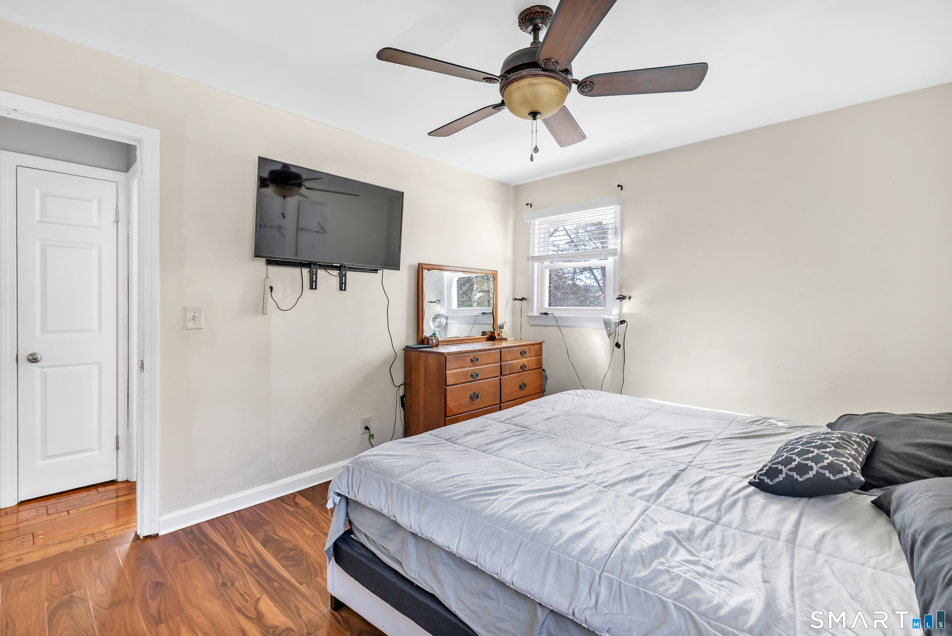 52 Cook Lane Beacon Falls, CT 06403 - Photo 20 of 24 a bedroom with a bed and a flat screen tv