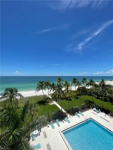 a view of a lake with a yard