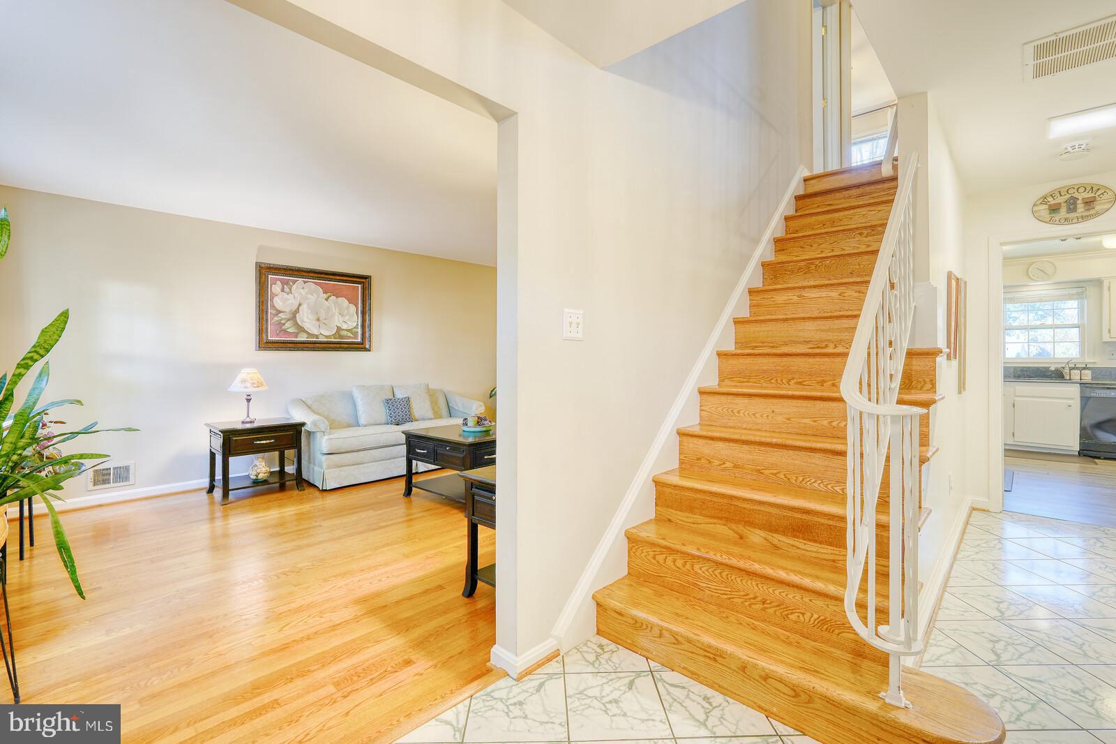 15312 Durant Street Silver Spring, MD 20905 - Photo 13 of 64 a view of entryway and hall with wooden floor