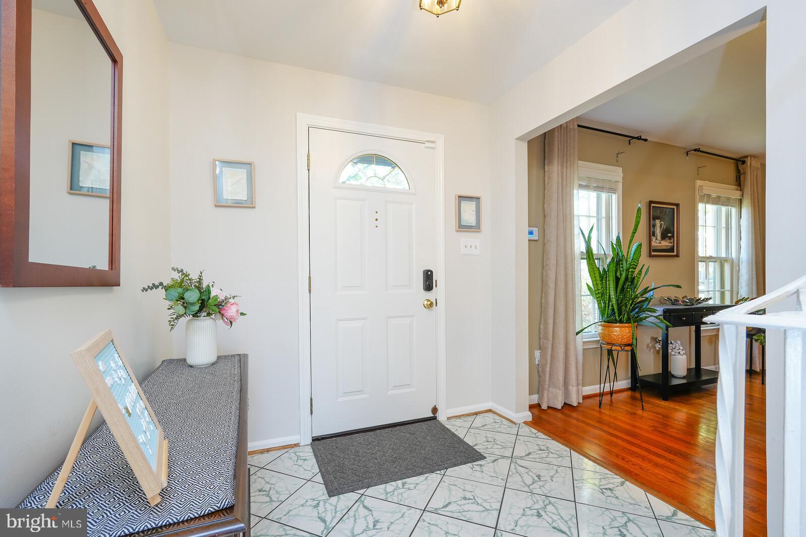 15312 Durant Street Silver Spring, MD 20905 - Photo 14 of 64 a living room with furniture and a potted plant