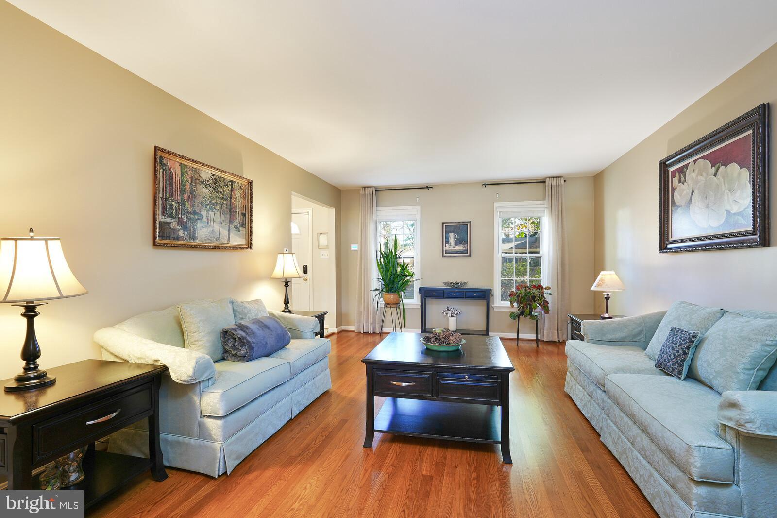 15312 Durant Street Silver Spring, MD 20905 - Photo 17 of 64 a living room with furniture and wooden floor