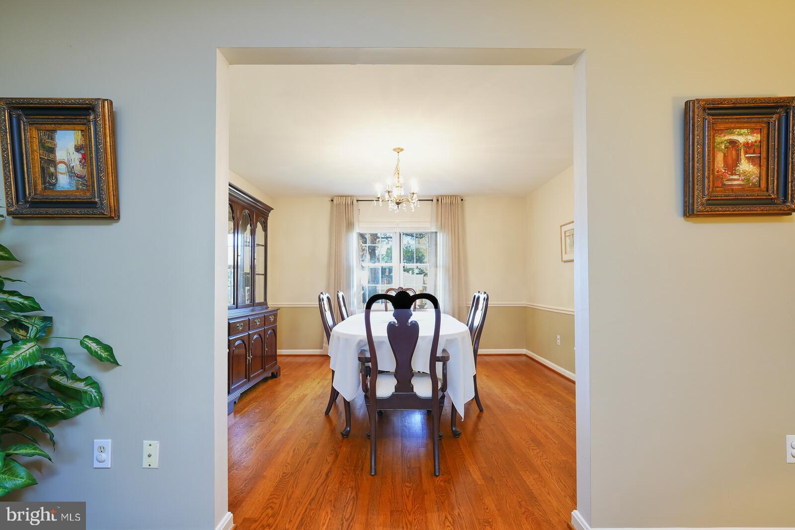 15312 Durant Street Silver Spring, MD 20905 - Photo 20 of 64 a view of a dining room with furniture window and wooden floor