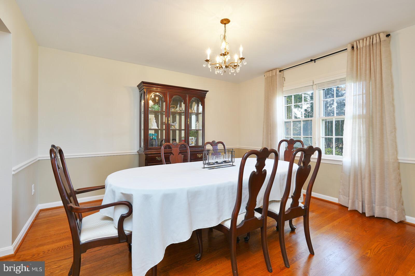 15312 Durant Street Silver Spring, MD 20905 - Photo 21 of 64 a view of a dining room with furniture window and wooden floor