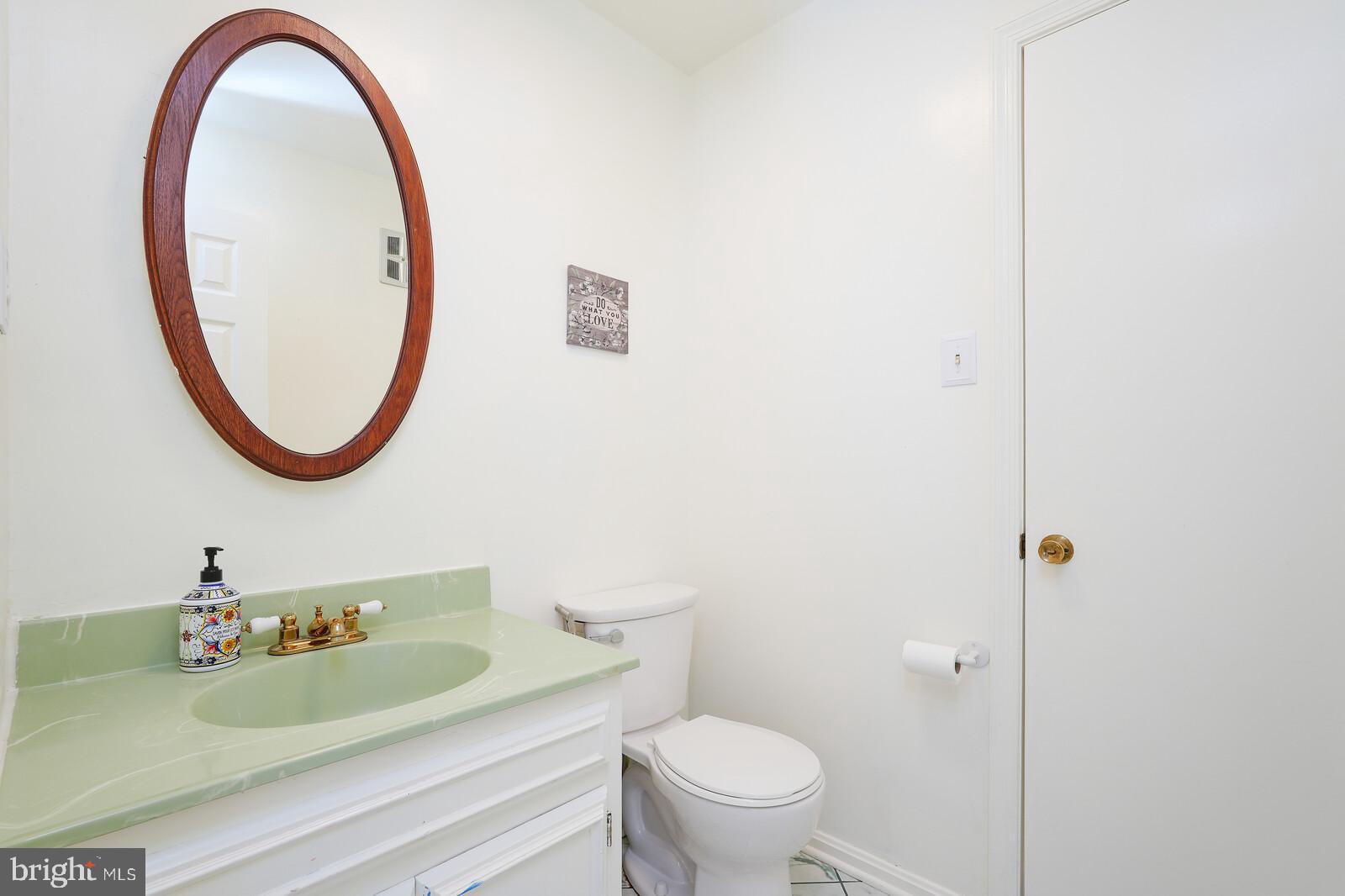 15312 Durant Street Silver Spring, MD 20905 - Photo 34 of 64 Half bath on main.