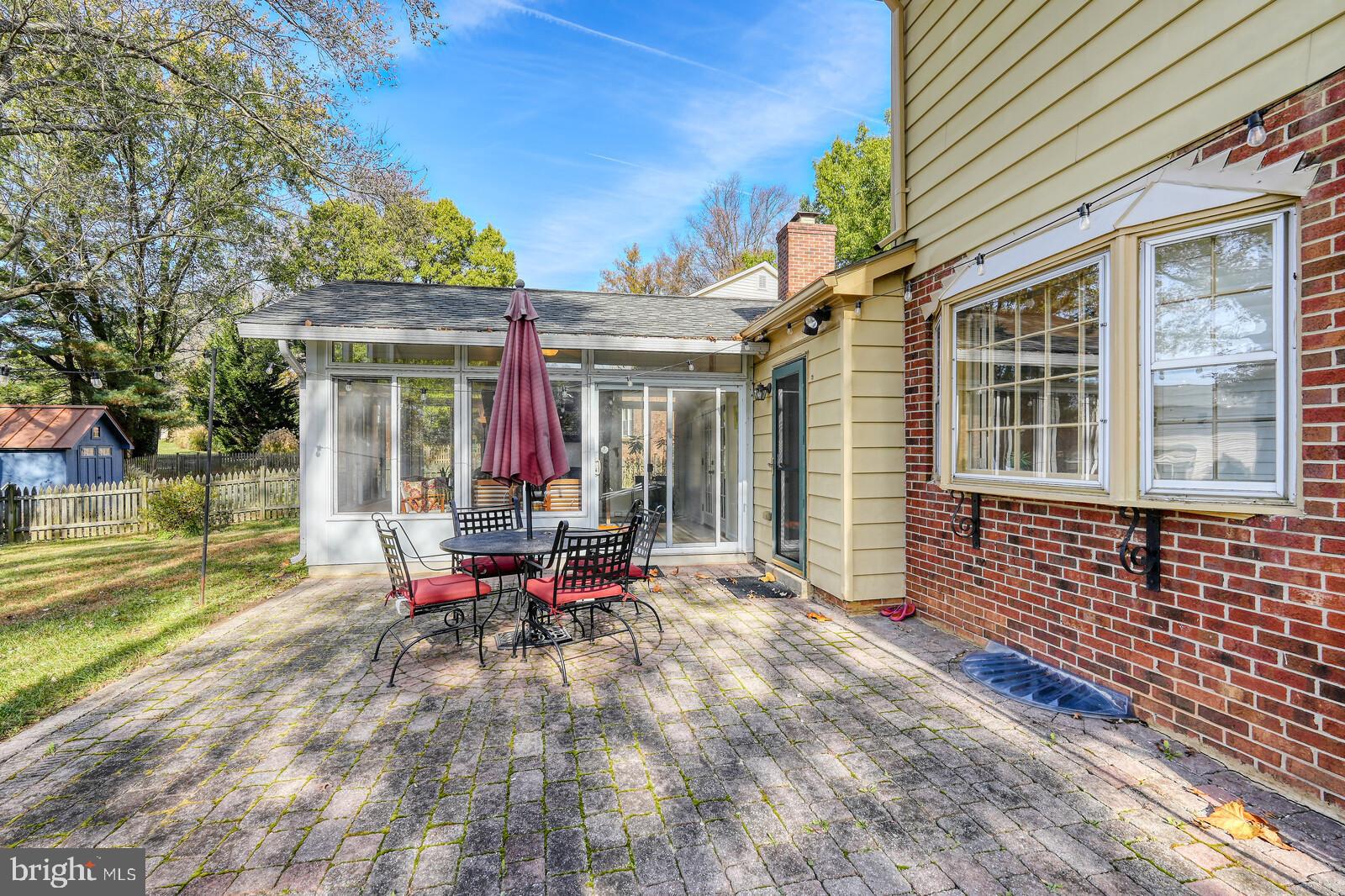 15312 Durant Street Silver Spring, MD 20905 - Photo 35 of 64 a view of a house with sitting area and garden