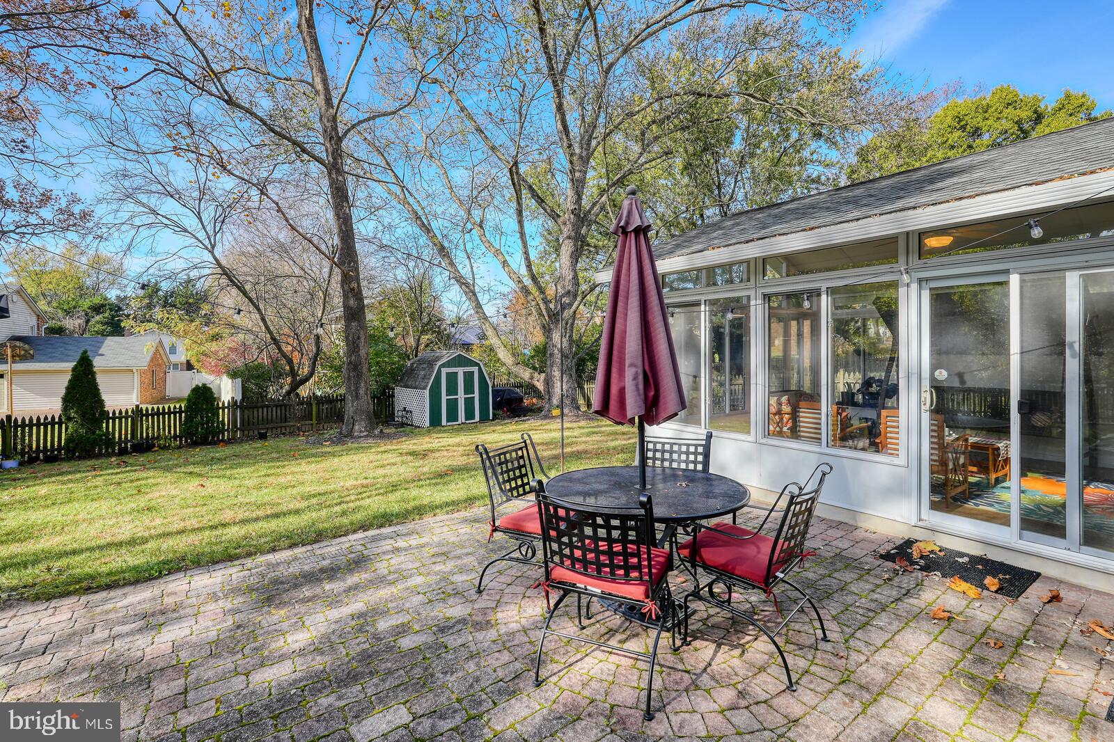 15312 Durant Street Silver Spring, MD 20905 - Photo 38 of 64 a view of a house with backyard and sitting area