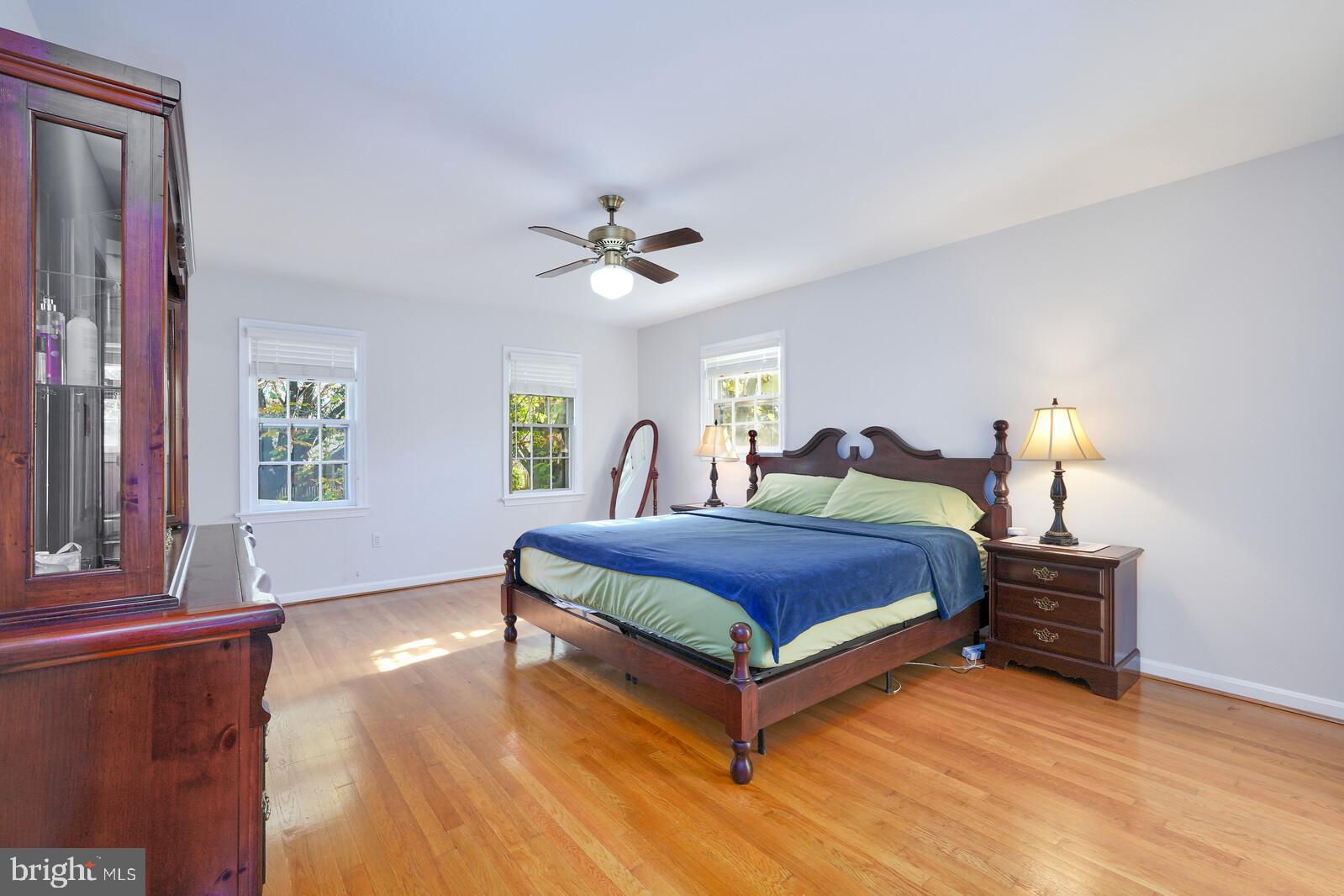 15312 Durant Street Silver Spring, MD 20905 - Photo 45 of 64 a bedroom with a bed and window