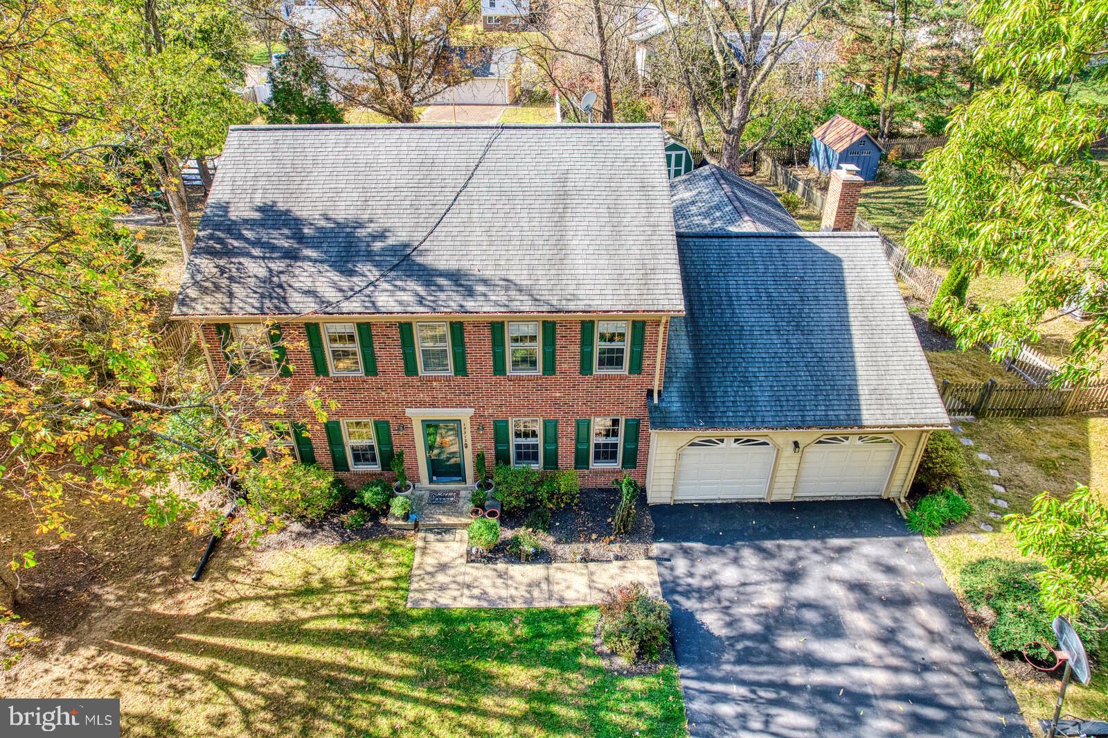 15312 Durant Street Silver Spring, MD 20905 - Photo 5 of 64 a aerial view of a house with a yard and sitting area