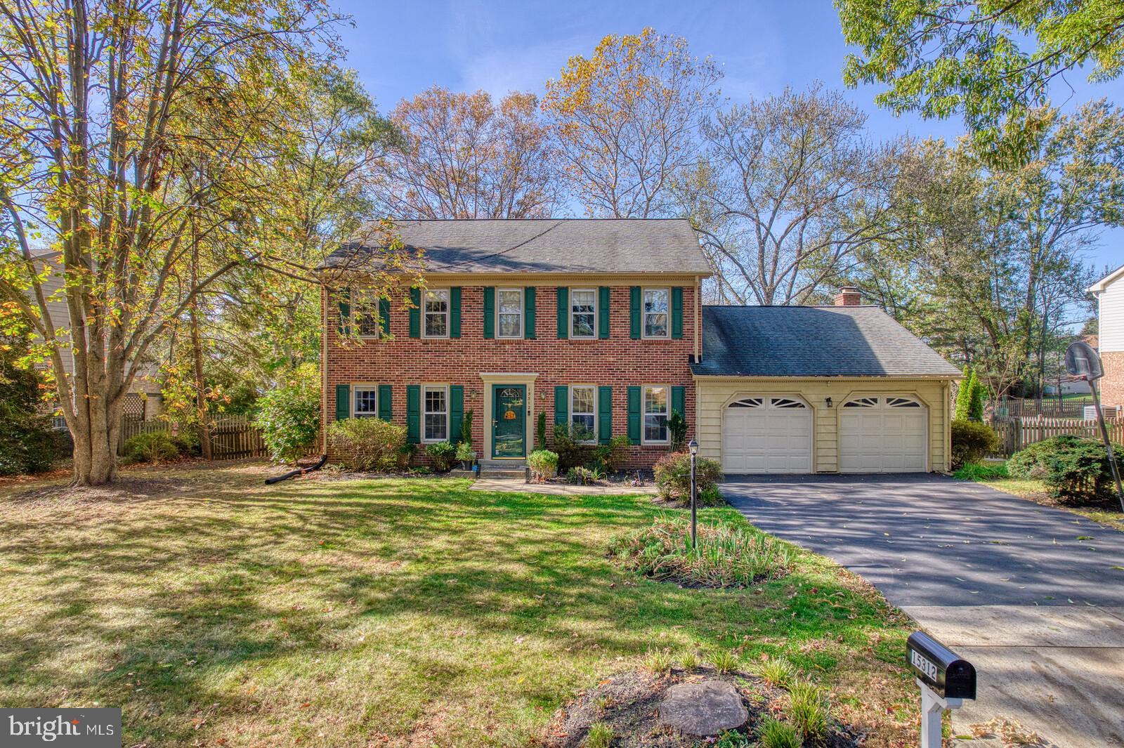 15312 Durant Street Silver Spring, MD 20905 - Photo 60 of 64 a front view of a house with a yard