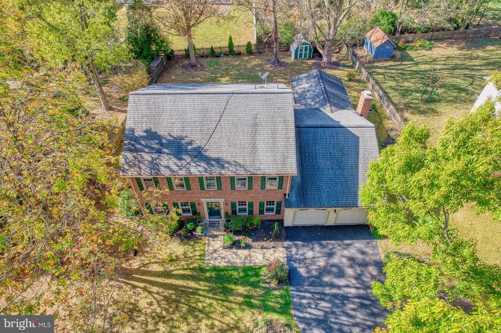 15312 Durant Street Silver Spring, MD 20905 - Photo 6 of 64 a view of a house with a yard and potted plants