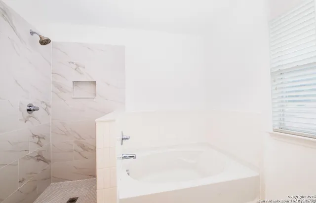 a bathroom with a bathtub