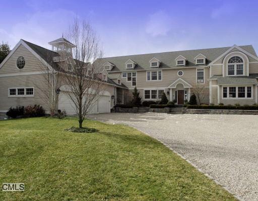 26 Soundview Farm Road Weston, CT 06883 - Photo 1 of 1 a front view of a house with a yard