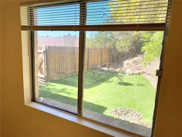 a view of a room and window