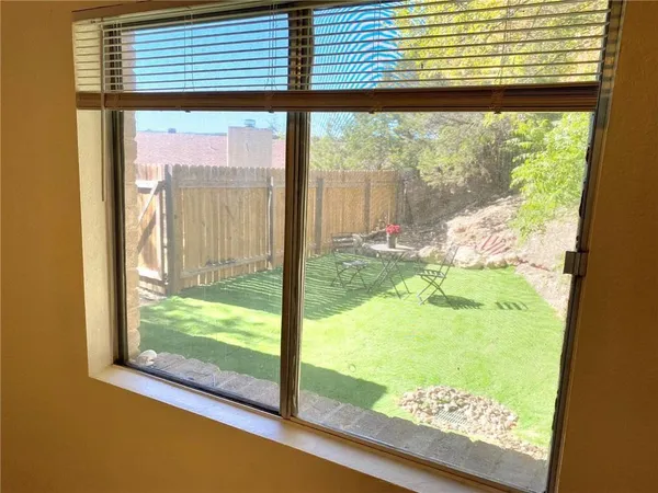 a view of a room and window
