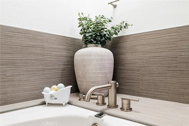 a bathroom with a shower toilet and sink