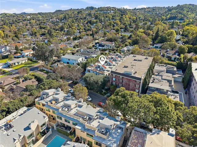 an aerial view of residential house with outdoor space