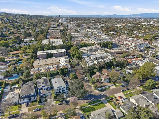 an aerial view of residential house with outdoor space