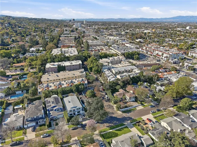an aerial view of residential house with outdoor space