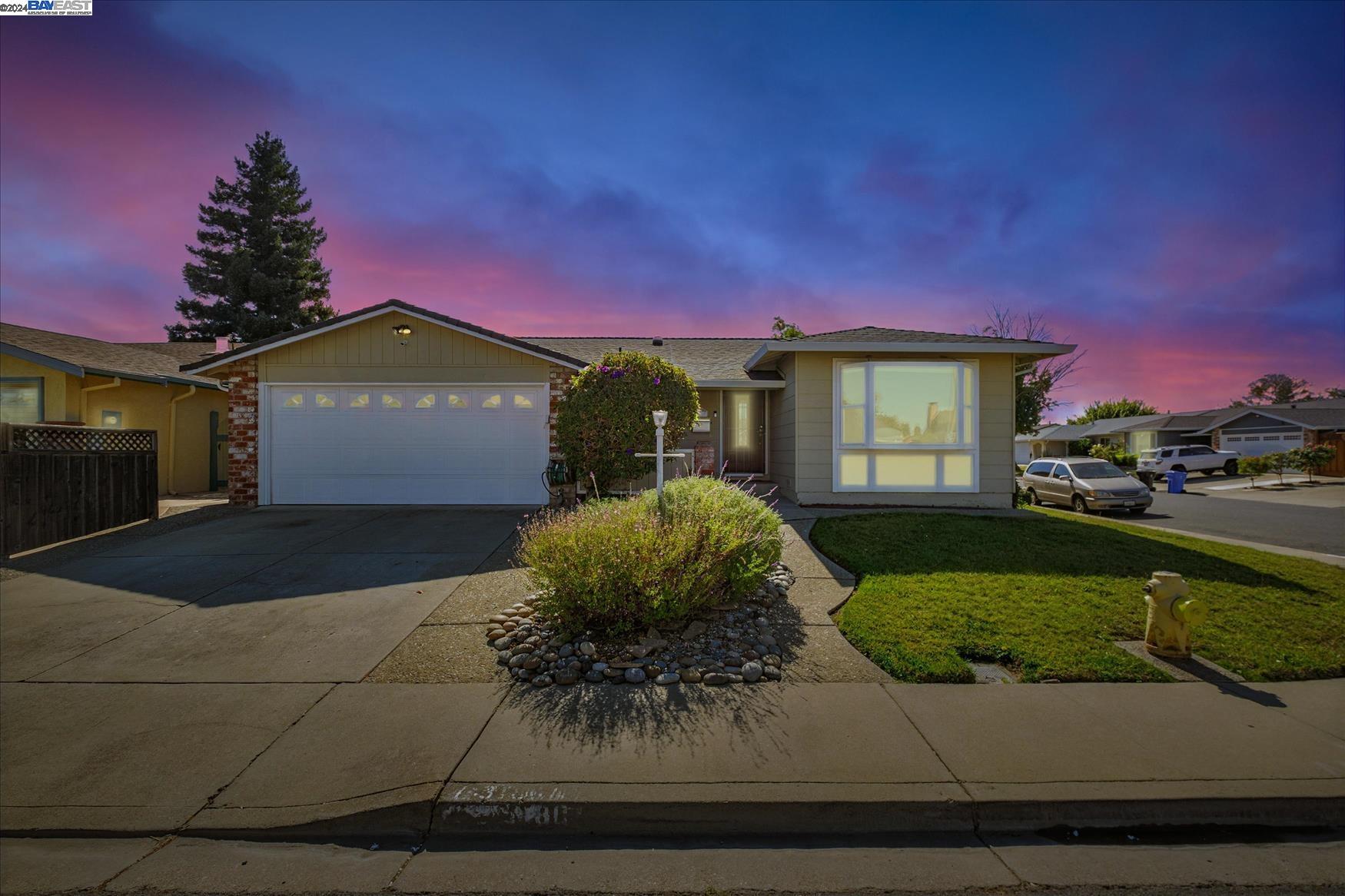 3180 Raleigh Court Fremont, CA 94555 - Photo 1 of 1 a front view of a house with a yard