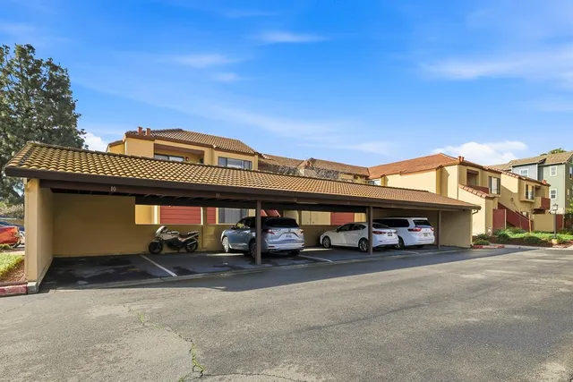 a view of a swimming pool with a lounge chairs