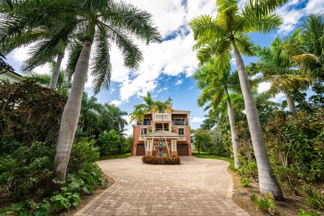 a view of a swimming pool with an outdoor space and seating area