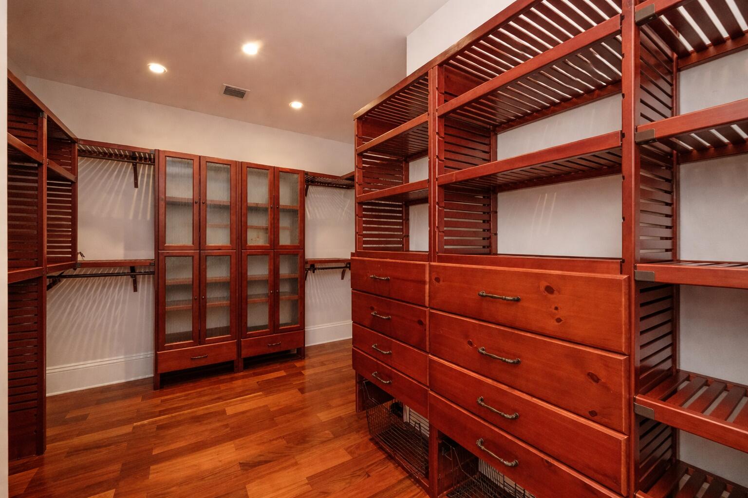 30 Cannon Royal Drive Shark Key, FL 33040 - Photo 27 of 48 a view of walk in closet with clothes and shoes