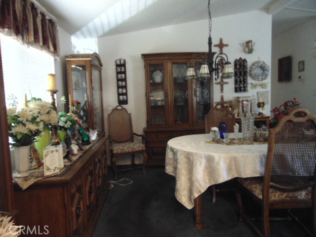3835 Gardiner Ferry Road, Unit 62 Corning, CA 96021 - Photo 16 of 34 a dining room with furniture and window