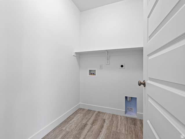 18 South Crimson Way, Unit 304 Mapleton, UT 84664 - Photo 14 of 17 Laundry room with light wood-type flooring, washer hookup, and hookup for an electric dryer