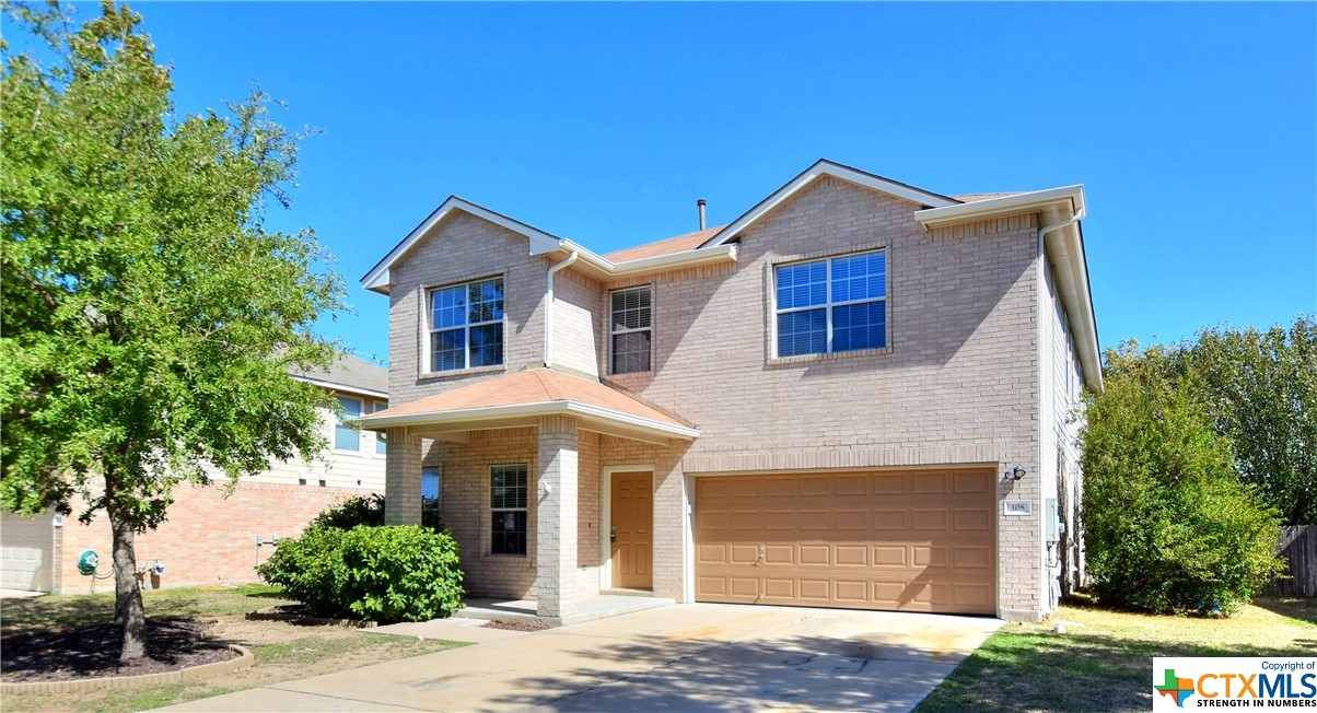 108 Fossil Trail Leander, TX 78641 - Photo 1 of 1 a front view of a house with yard