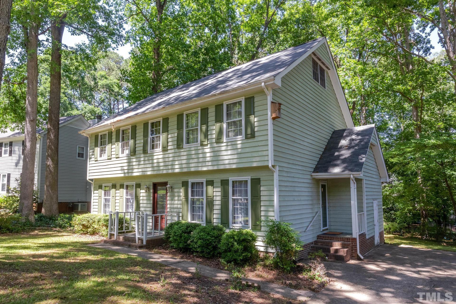 5904 Rondan Circle Raleigh, NC 27612 - Photo 5 of 44 a front view of a house with garden
