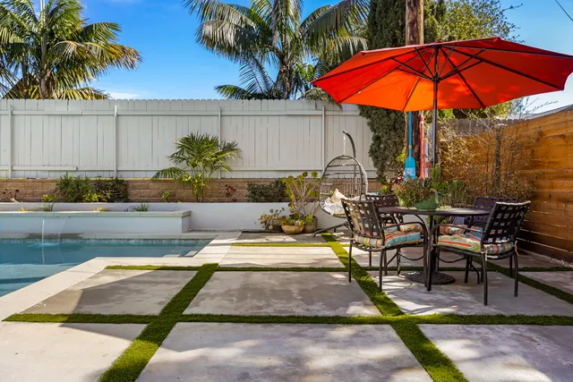 a view of a chair and table in back