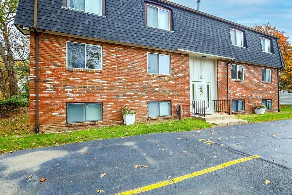 109 Maple Street, Unit E3 Attleboro, MA 02703 - Photo 1 of 18 a brick building that has a lots of windows in it