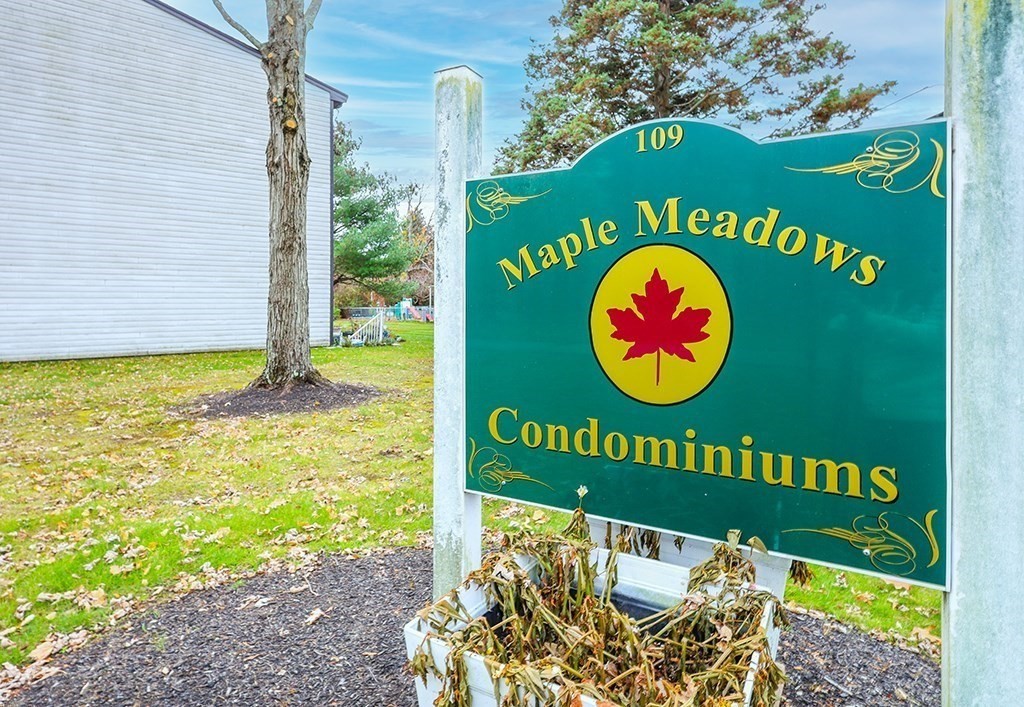 109 Maple Street, Unit E3 Attleboro, MA 02703 - Photo 3 of 18 a sign that is on a sign board