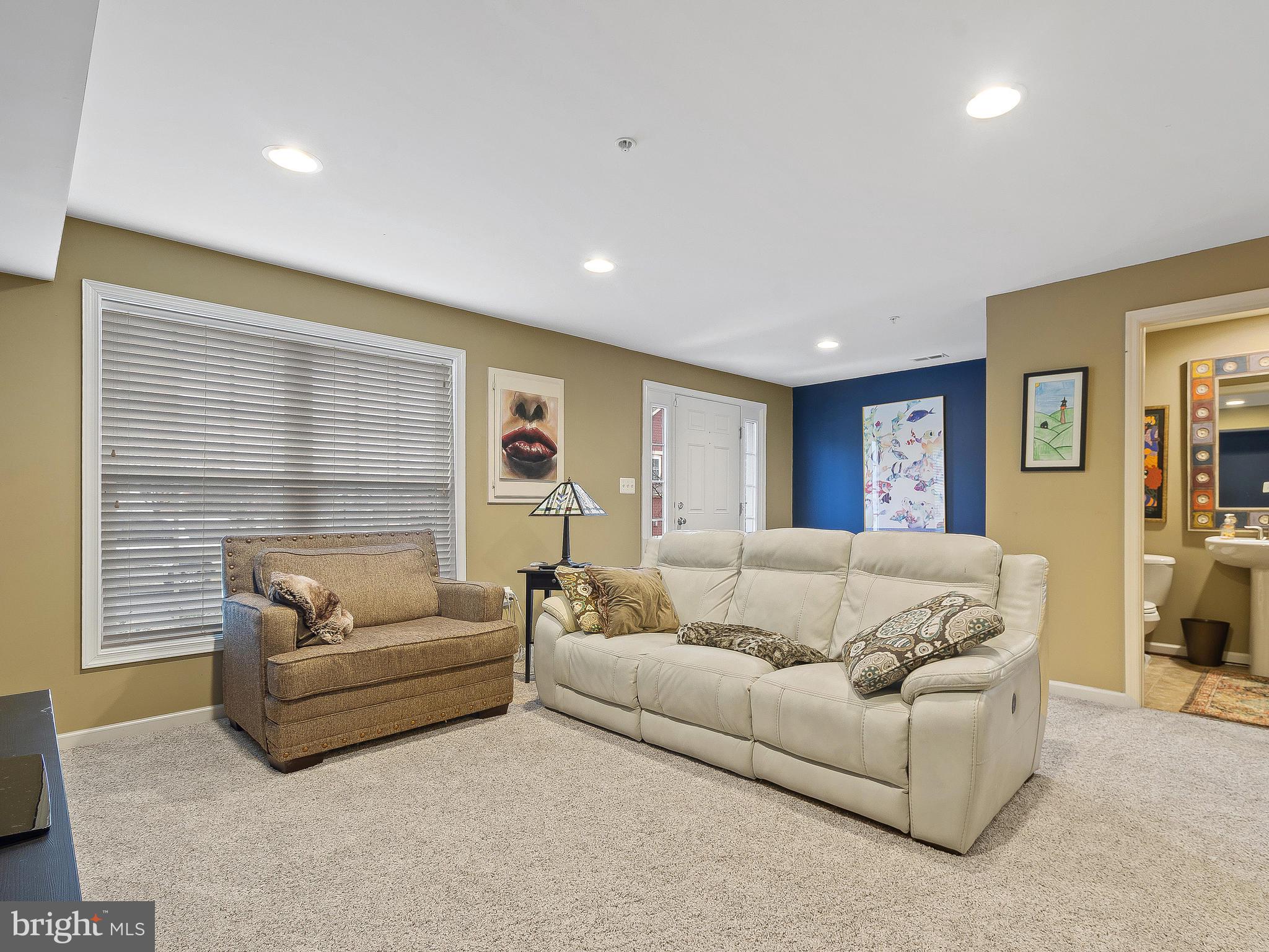 13610 Stargazer Lane Silver Spring, MD 20906 - Photo 35 of 43 a living room with furniture and a large window
