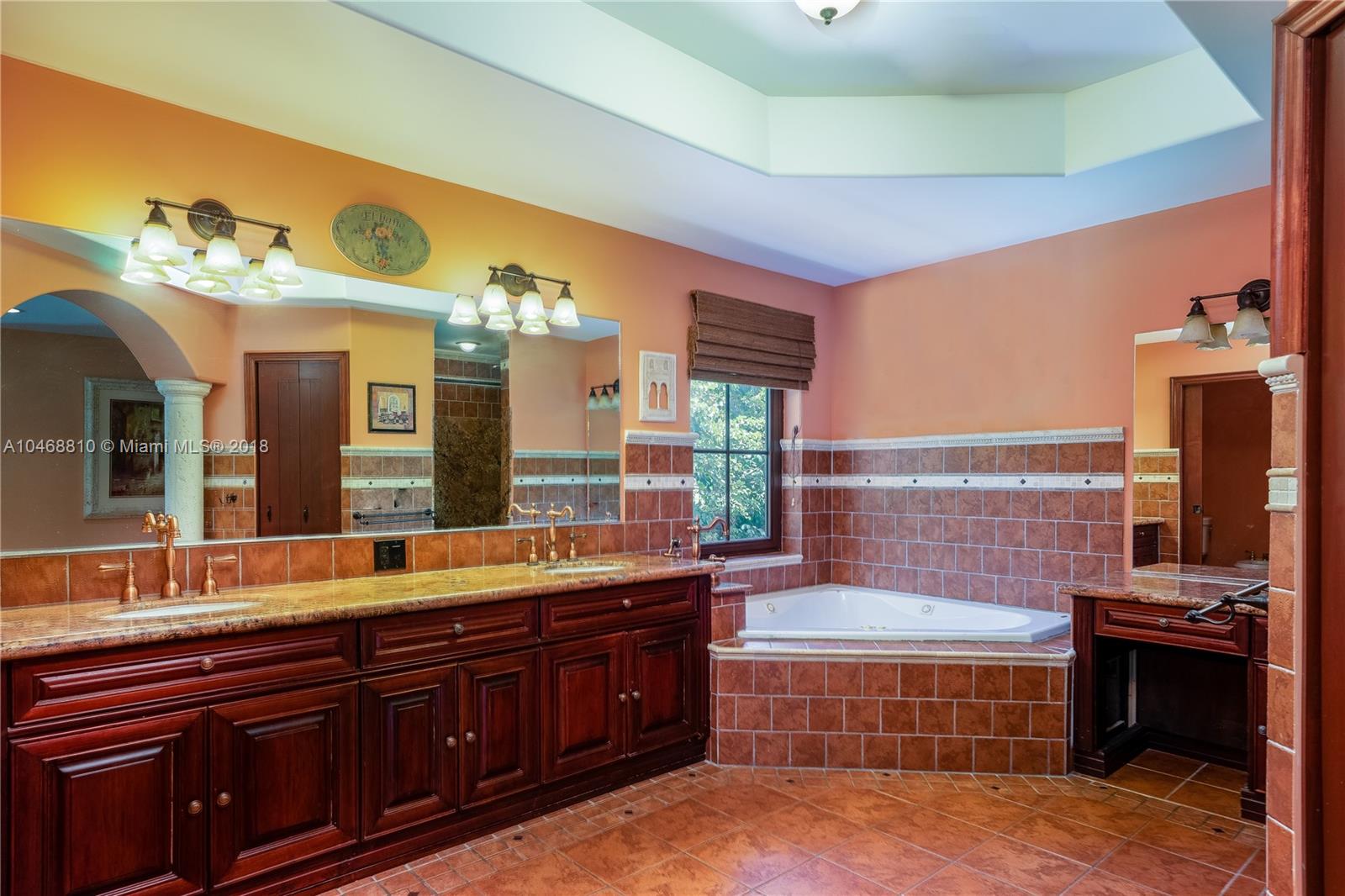 3451 Fox Trail Miramar, FL 33027 - Photo 8 of 33 a bathroom with a bathtub and double vanity