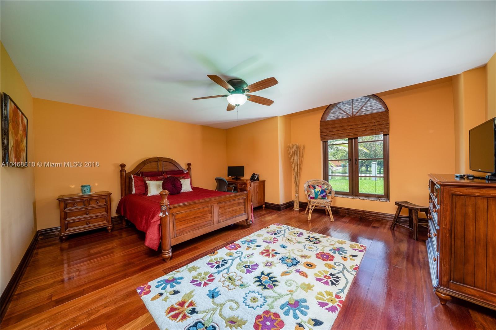 3451 Fox Trail Miramar, FL 33027 - Photo 9 of 33 a bedroom with furniture and a wooden floor