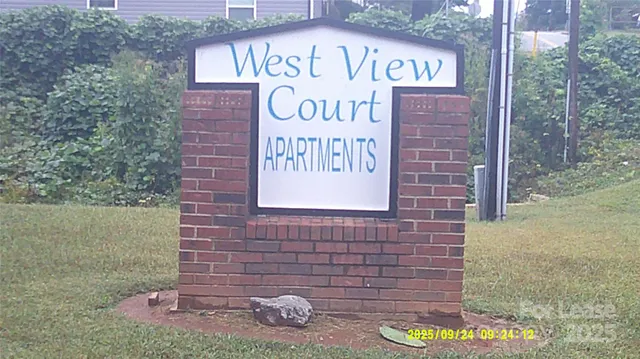 a sign that is on the wall of building