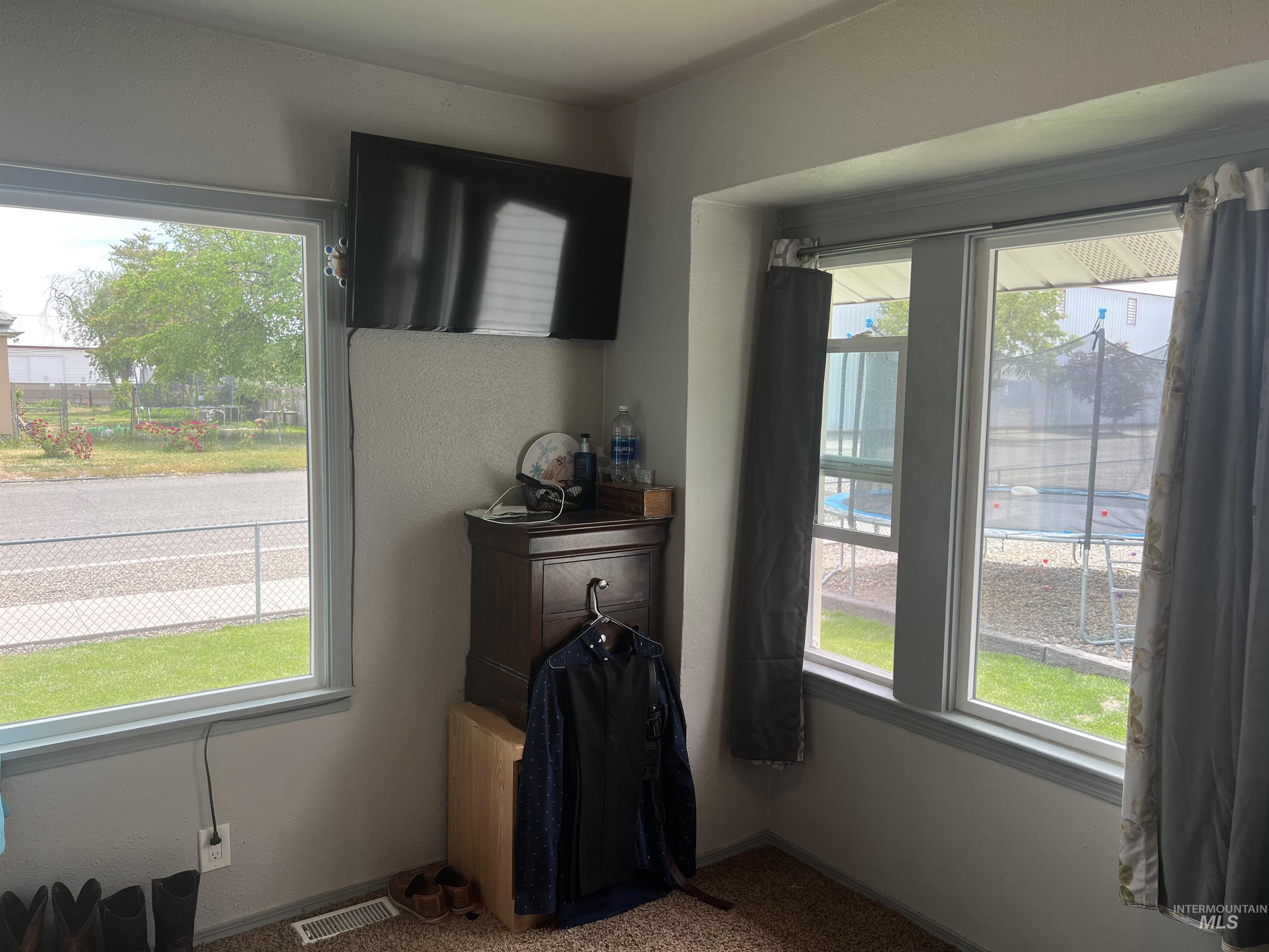 121 North 1st Street Nyssa, OR 97913 - Photo 9 of 20 Corner window configuration featuring multiple double-hung windows with white frames