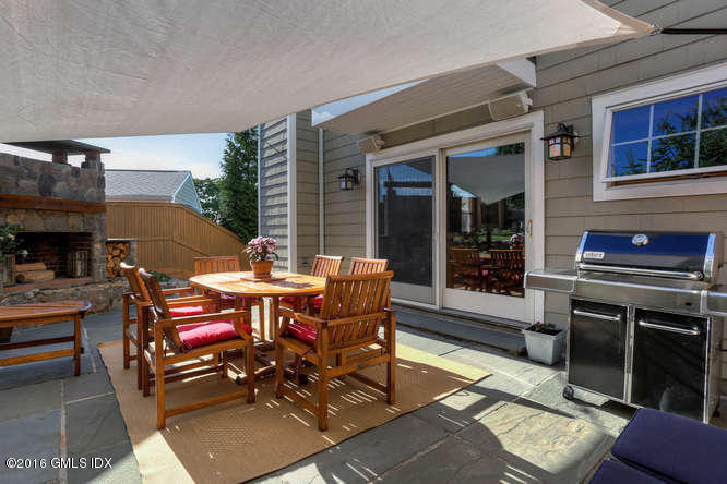 16 Apache Place Riverside, CT 06878 - Photo 13 of 27 a view of a dinning tables and chairs in the patio