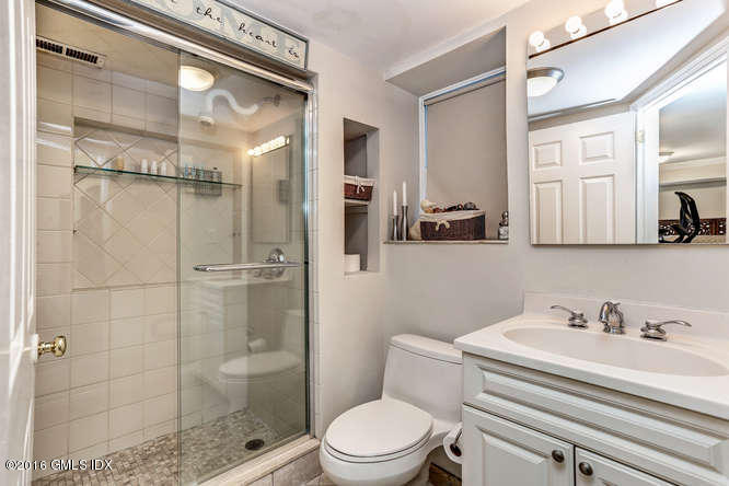 16 Apache Place Riverside, CT 06878 - Photo 23 of 27 a bathroom with a sink toilet and shower