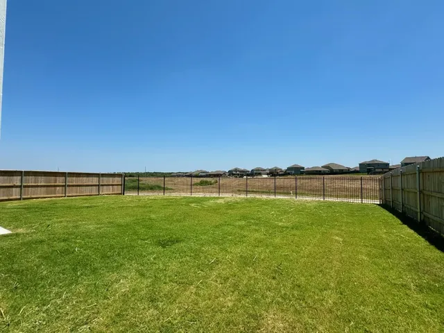 a view of an outdoor space and a yard